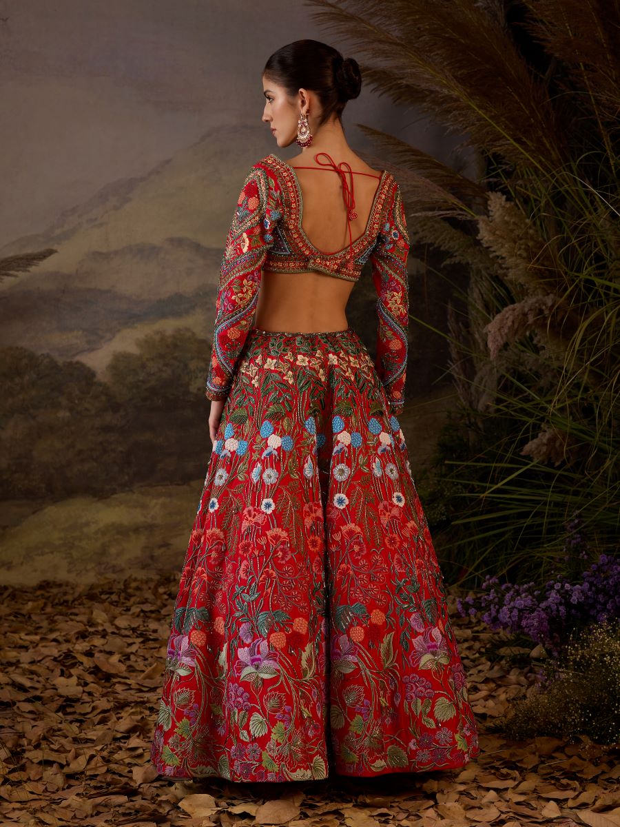 https://cdn.shopify.com/s/files/1/0088/3441/6706/files/a-red-organza-cotton-silk-lengha-with-v-neck-line-7682123.jpg?v=1752388670