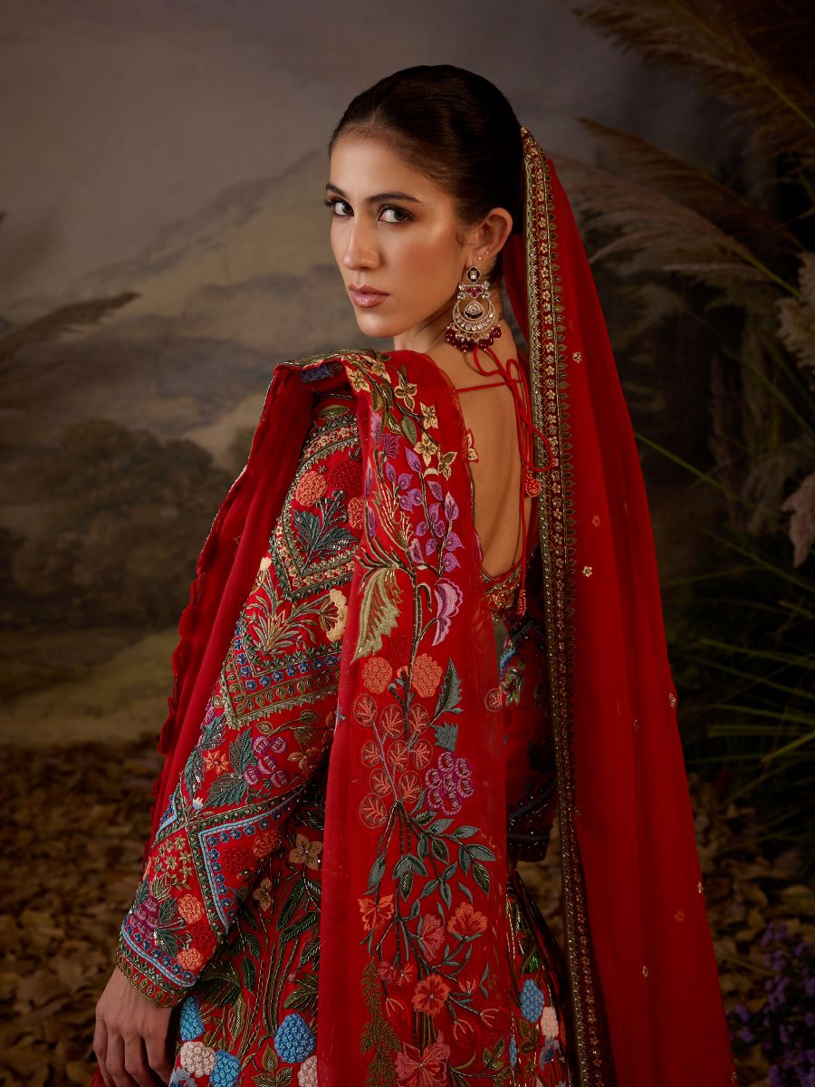 https://cdn.shopify.com/s/files/1/0088/3441/6706/files/a-red-organza-cotton-silk-lengha-with-v-neck-line-8052640.jpg?v=1752388670