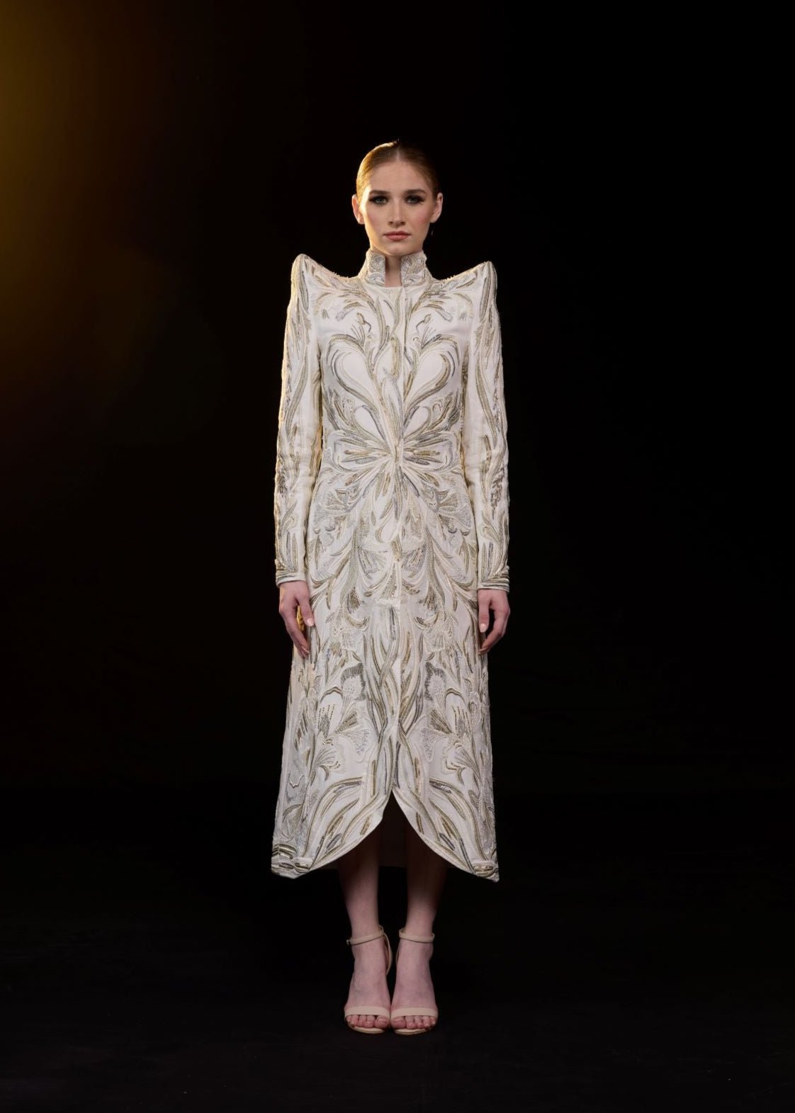 https://cdn.shopify.com/s/files/1/0088/3441/6706/files/a-sophisticated-midi-dress-features-a-high-neckline-and-long-sleeve-1251337.jpg?v=1752388528