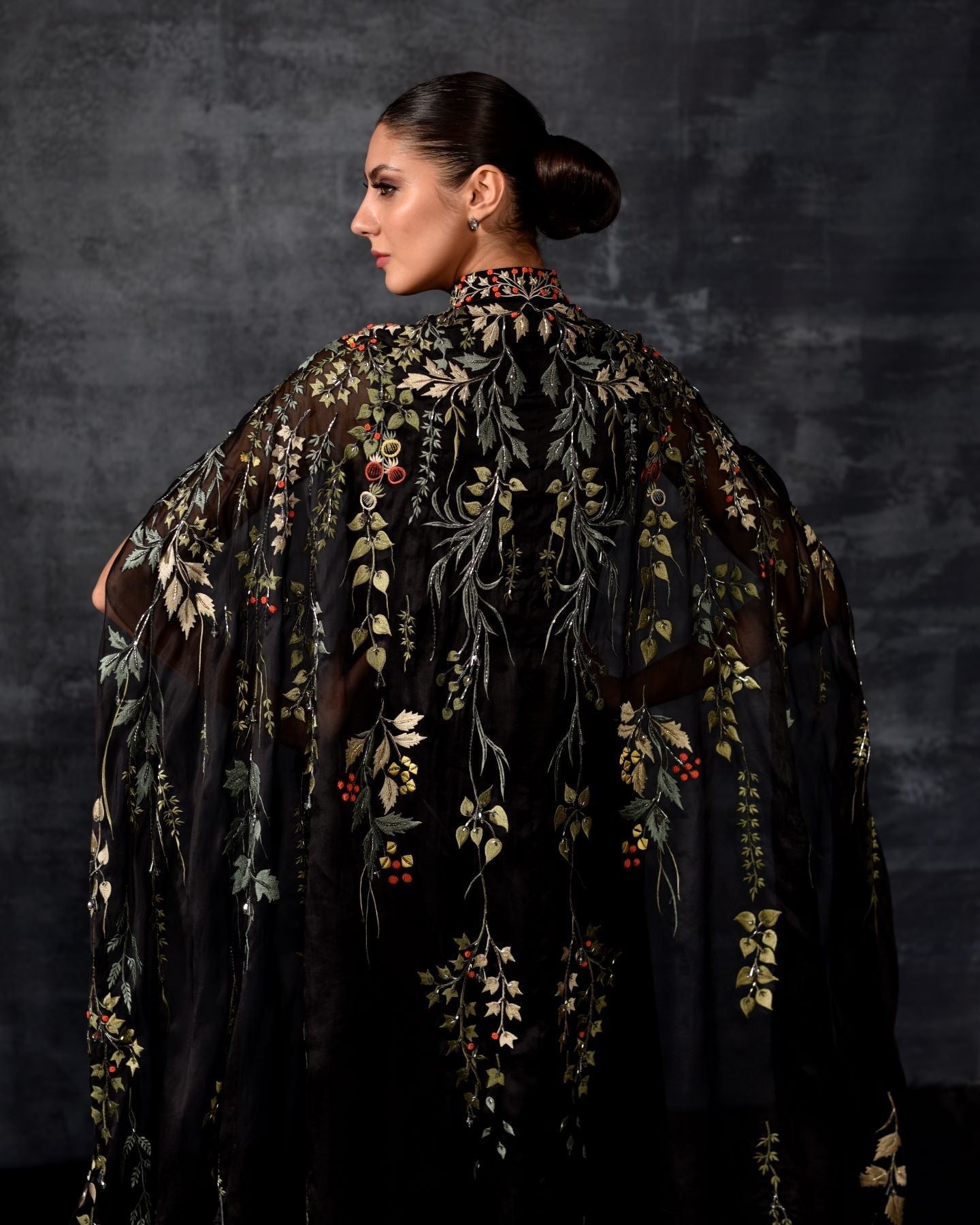 https://cdn.shopify.com/s/files/1/0088/3441/6706/files/black-embroidered-cape-gown-2231960.jpg?v=1752388639