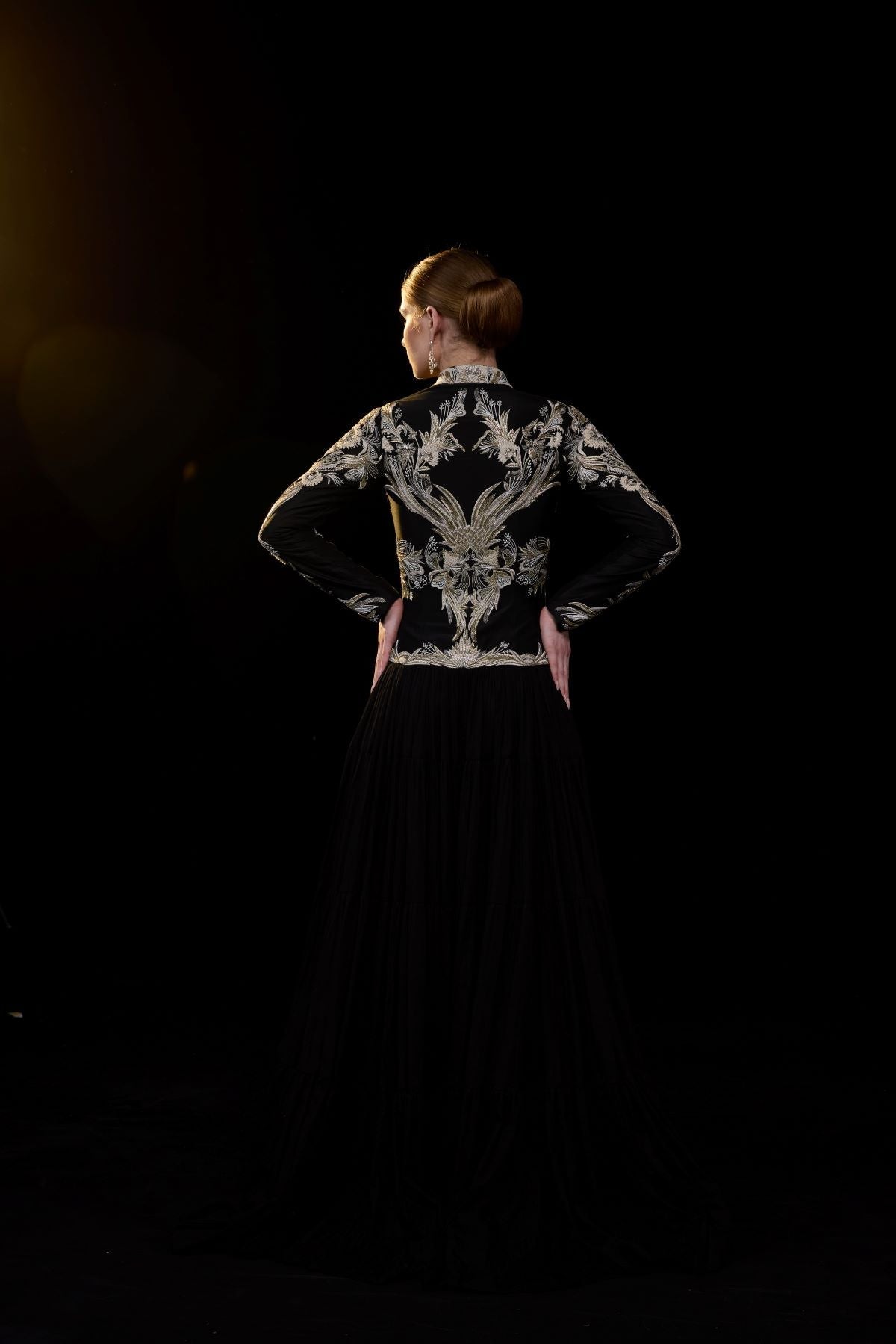 https://cdn.shopify.com/s/files/1/0088/3441/6706/files/black-gown-with-metallic-gold-embroidery-9982006.jpg?v=1752388530