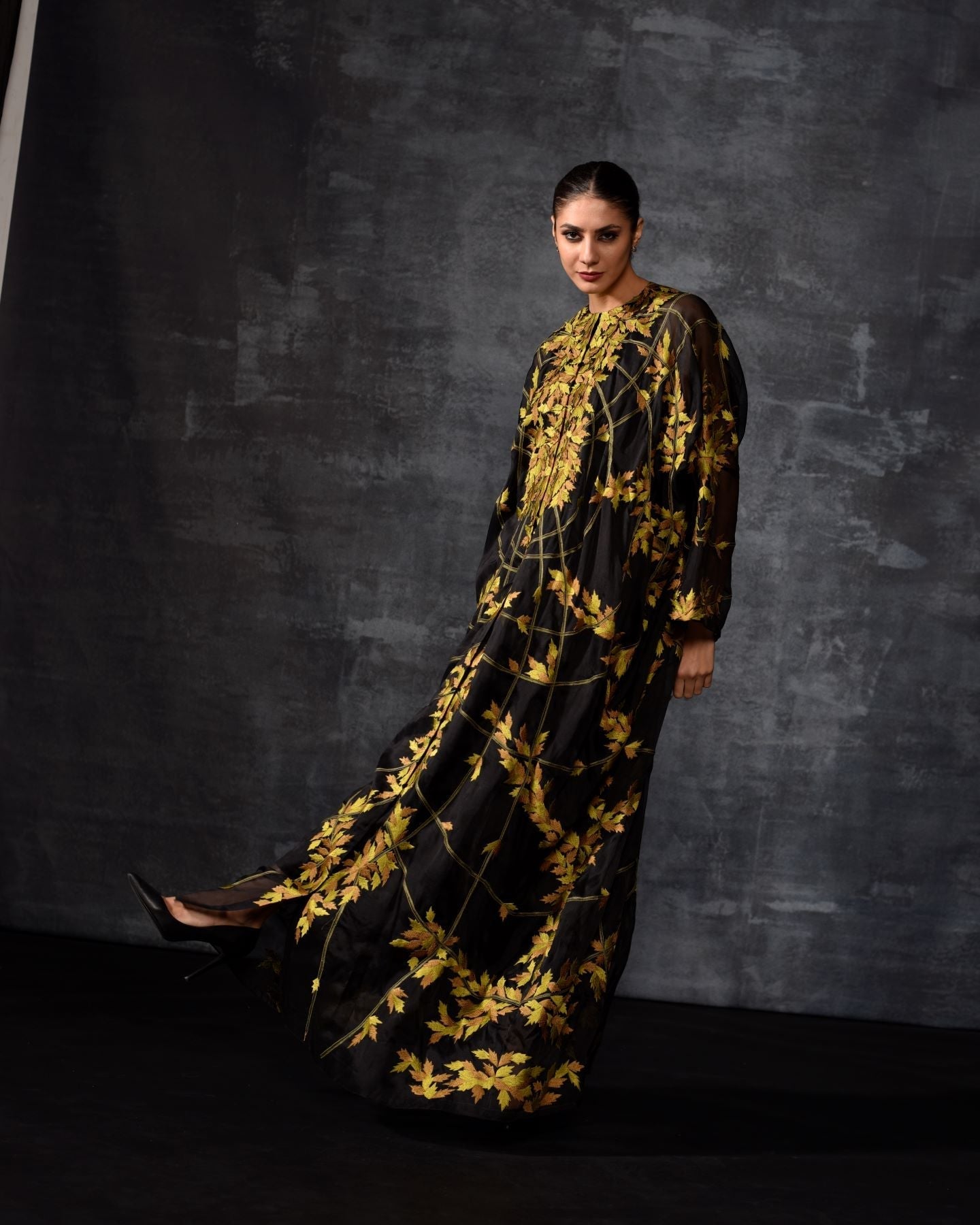 https://cdn.shopify.com/s/files/1/0088/3441/6706/files/black-yellow-embroidered-kaftan-7003128.jpg?v=1752388637