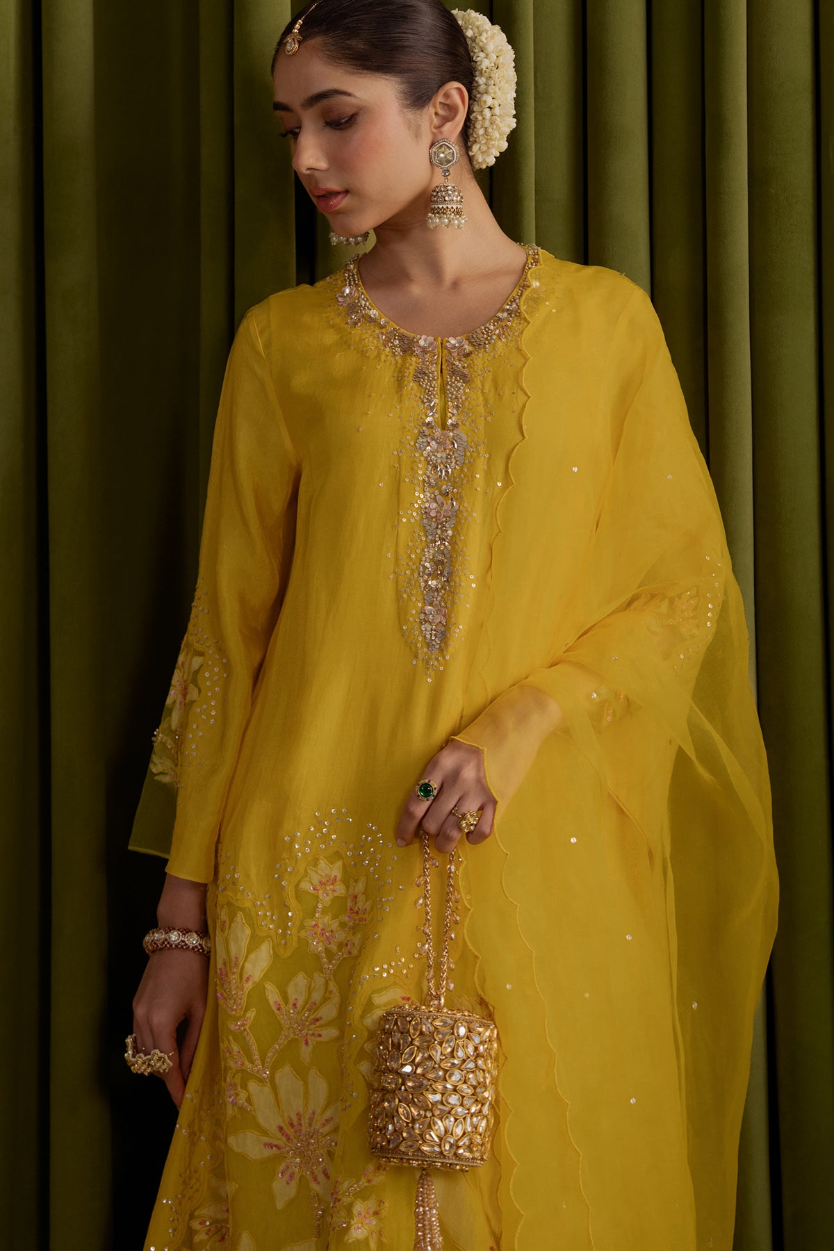 Mango kurta set in viscose silk base with embroidered magnolia flower pattern.
