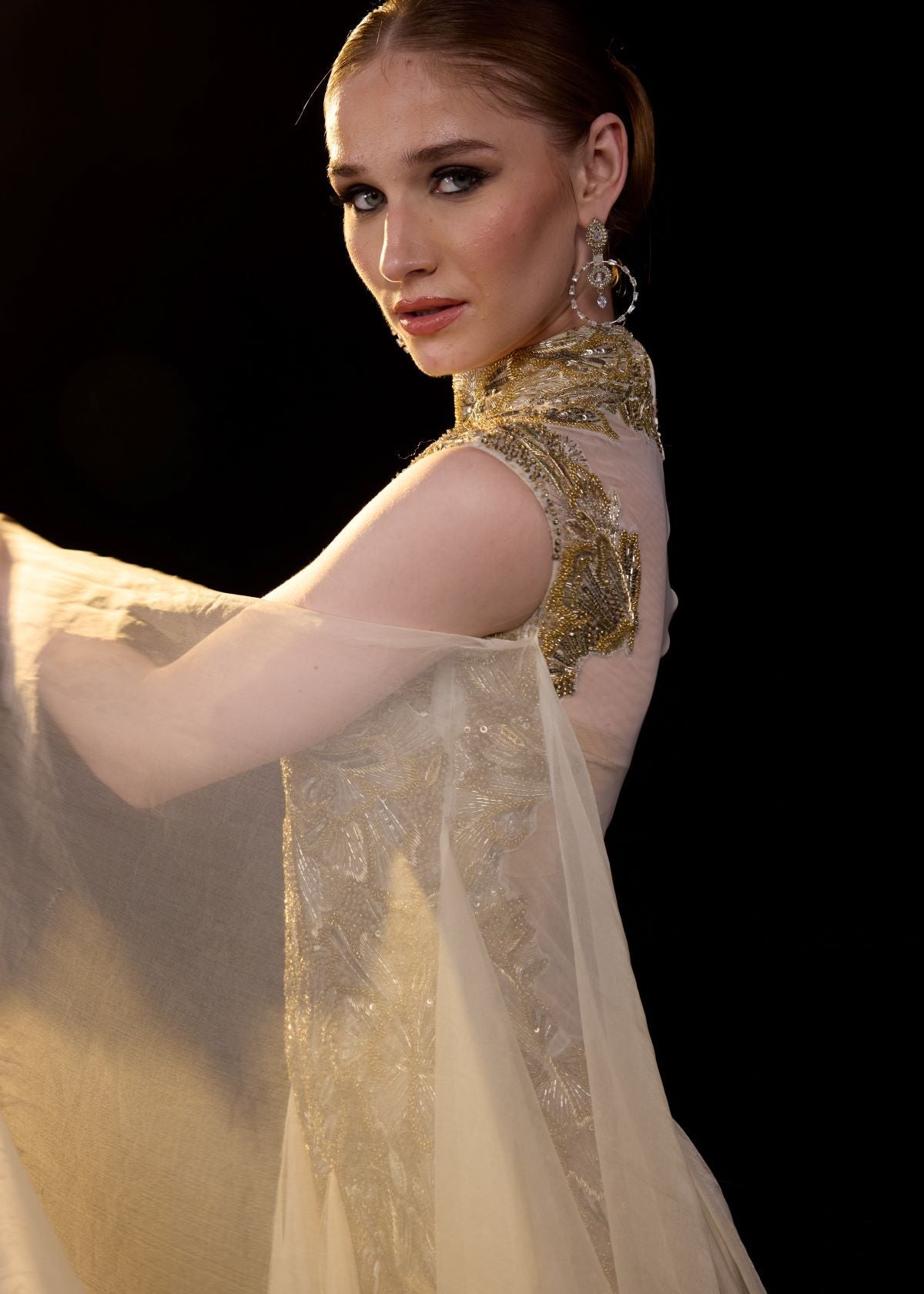 https://cdn.shopify.com/s/files/1/0088/3441/6706/files/embellished-gold-evening-gown-with-sheer-train-3884094.jpg?v=1753781128