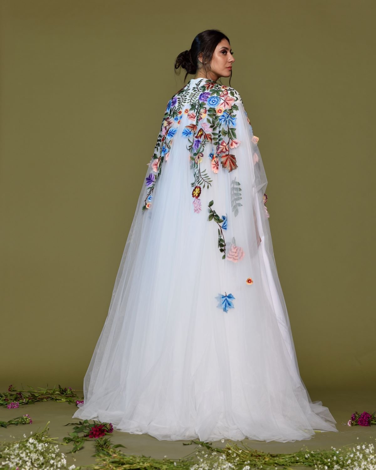 https://cdn.shopify.com/s/files/1/0088/3441/6706/files/ethereal-white-tulle-gown-with-embroidered-floral-cape-1982789.jpg?v=1752388607