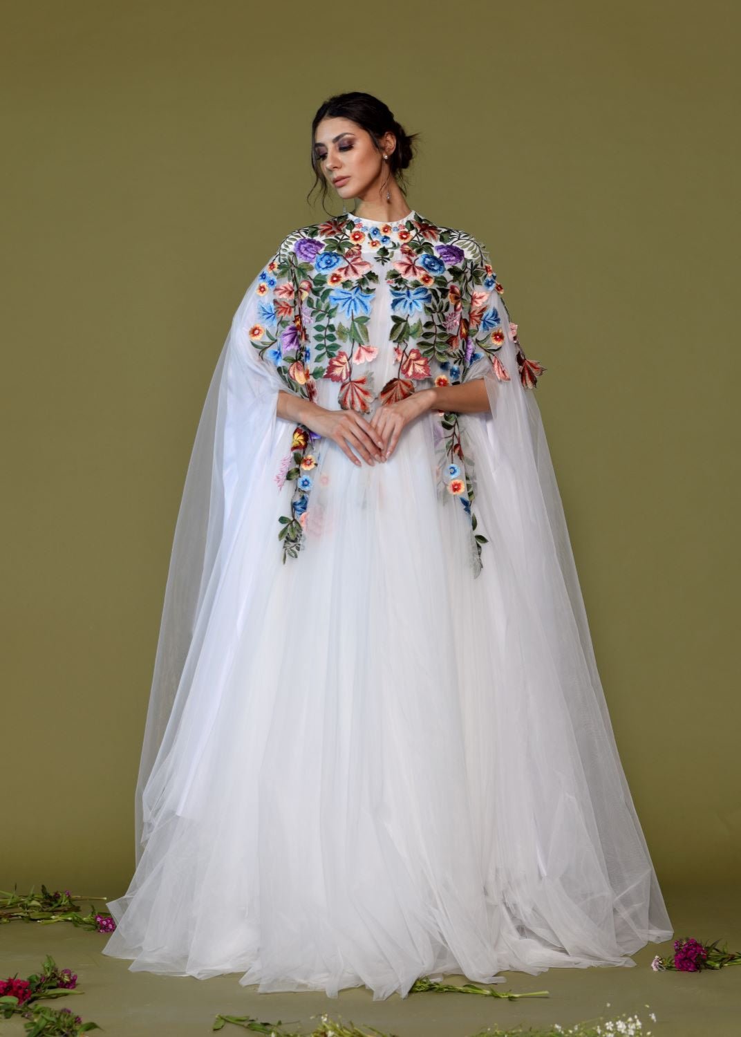 https://cdn.shopify.com/s/files/1/0088/3441/6706/files/ethereal-white-tulle-gown-with-embroidered-floral-cape-6059963.jpg?v=1752388606