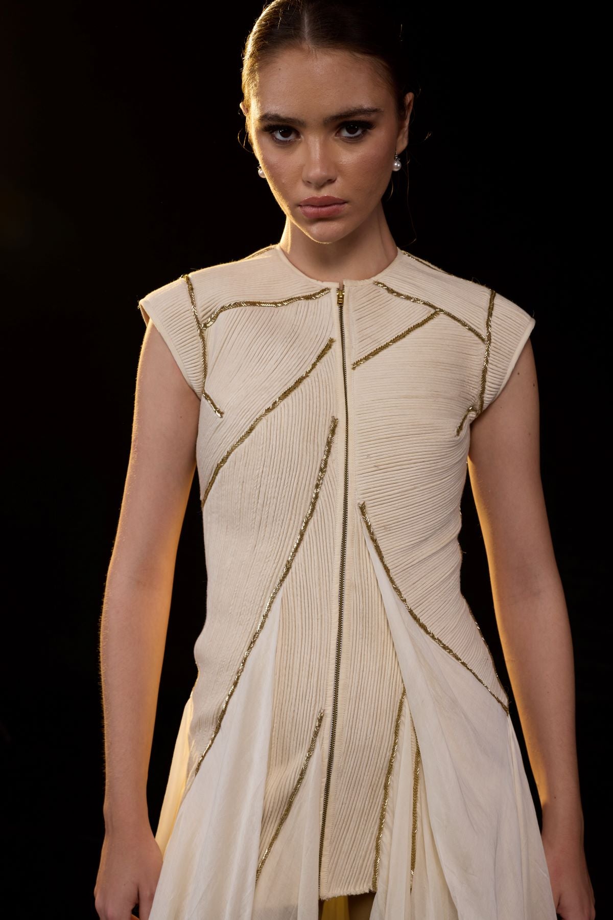 https://cdn.shopify.com/s/files/1/0088/3441/6706/files/ivory-structured-gown-with-a-sculpted-bodice-and-flowing-layered-panels-2422883.jpg?v=1752388530