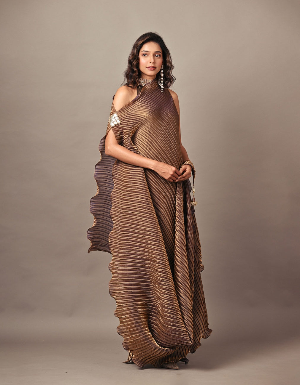 Antique gold box pleated drape with motif with tassel detail and jersey long dress with collar detail