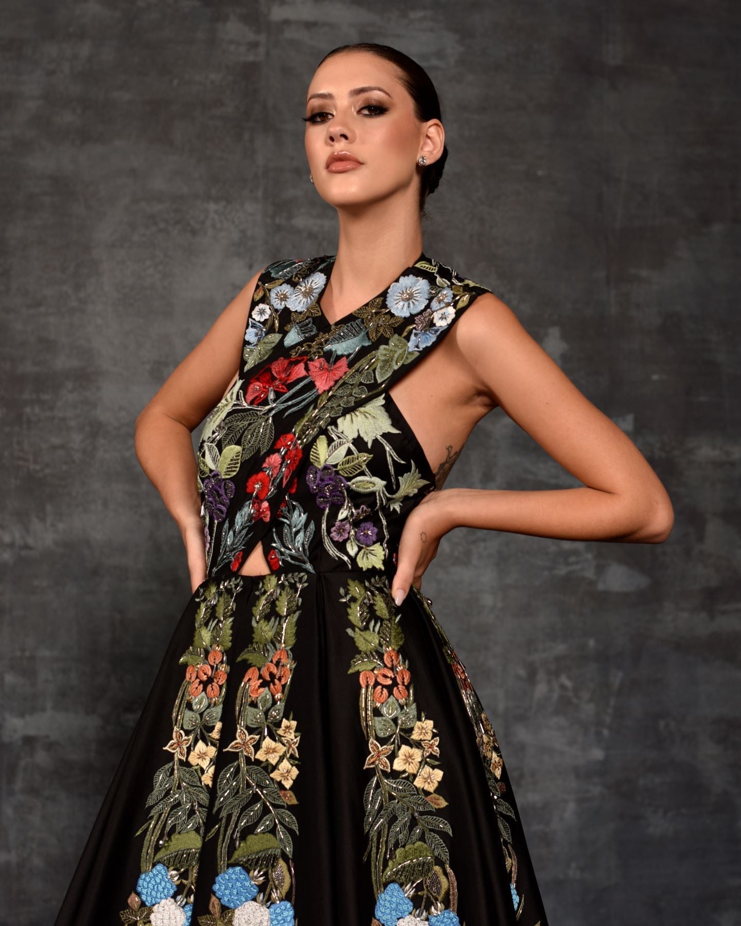 https://cdn.shopify.com/s/files/1/0088/3441/6706/files/striking-floral-embroidered-black-formal-gown-5035486.jpg?v=1752388613
