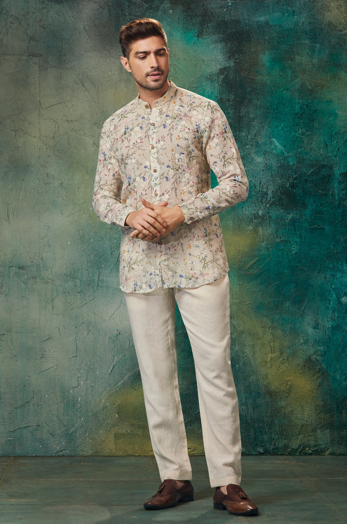 LINEN PRINTED AND MACHINE EMBROIDERED SHORT KURTA WITH SLIM PANT