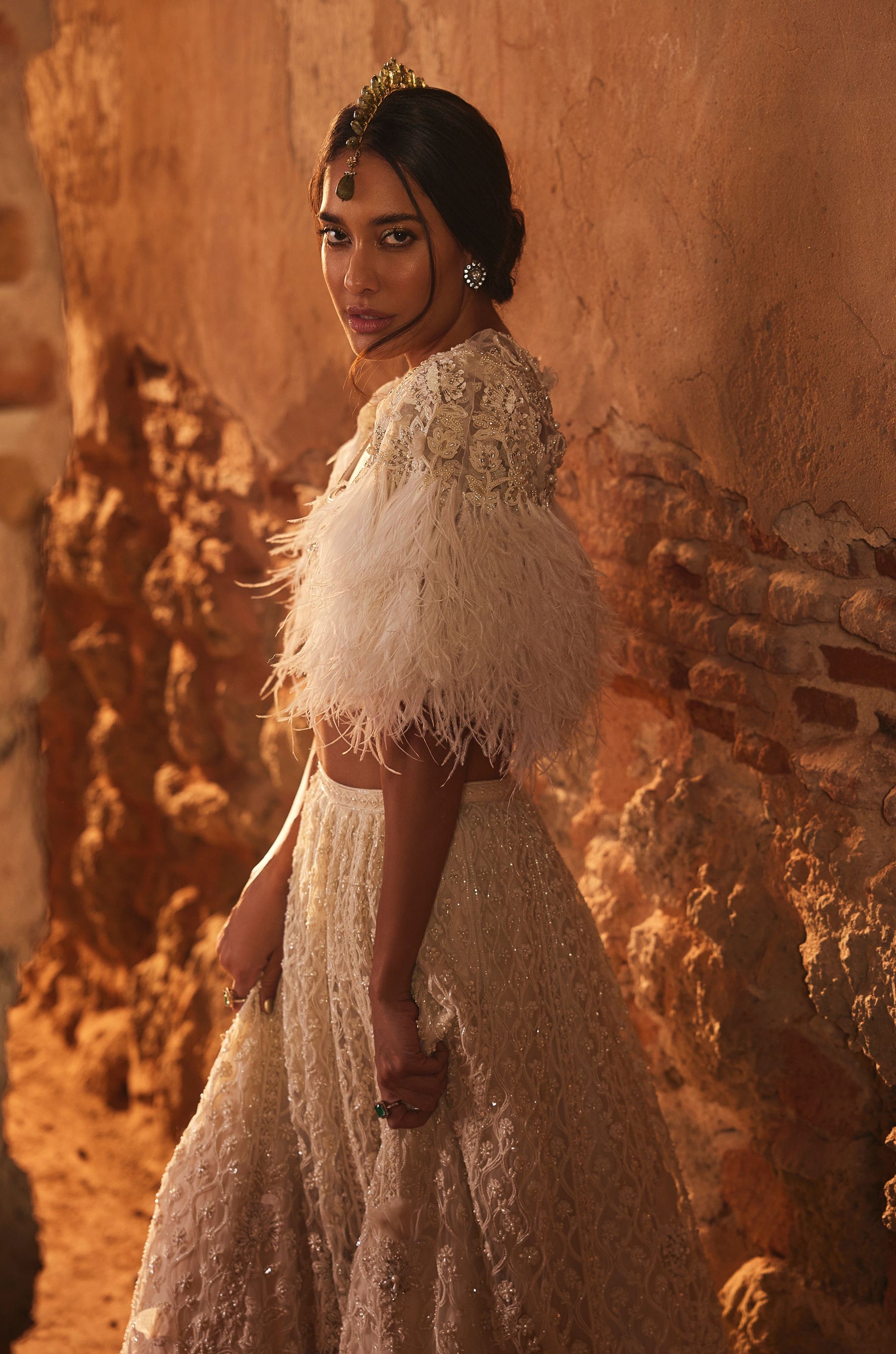 Ivory Net Embroidered Lehenga with Feather Cape