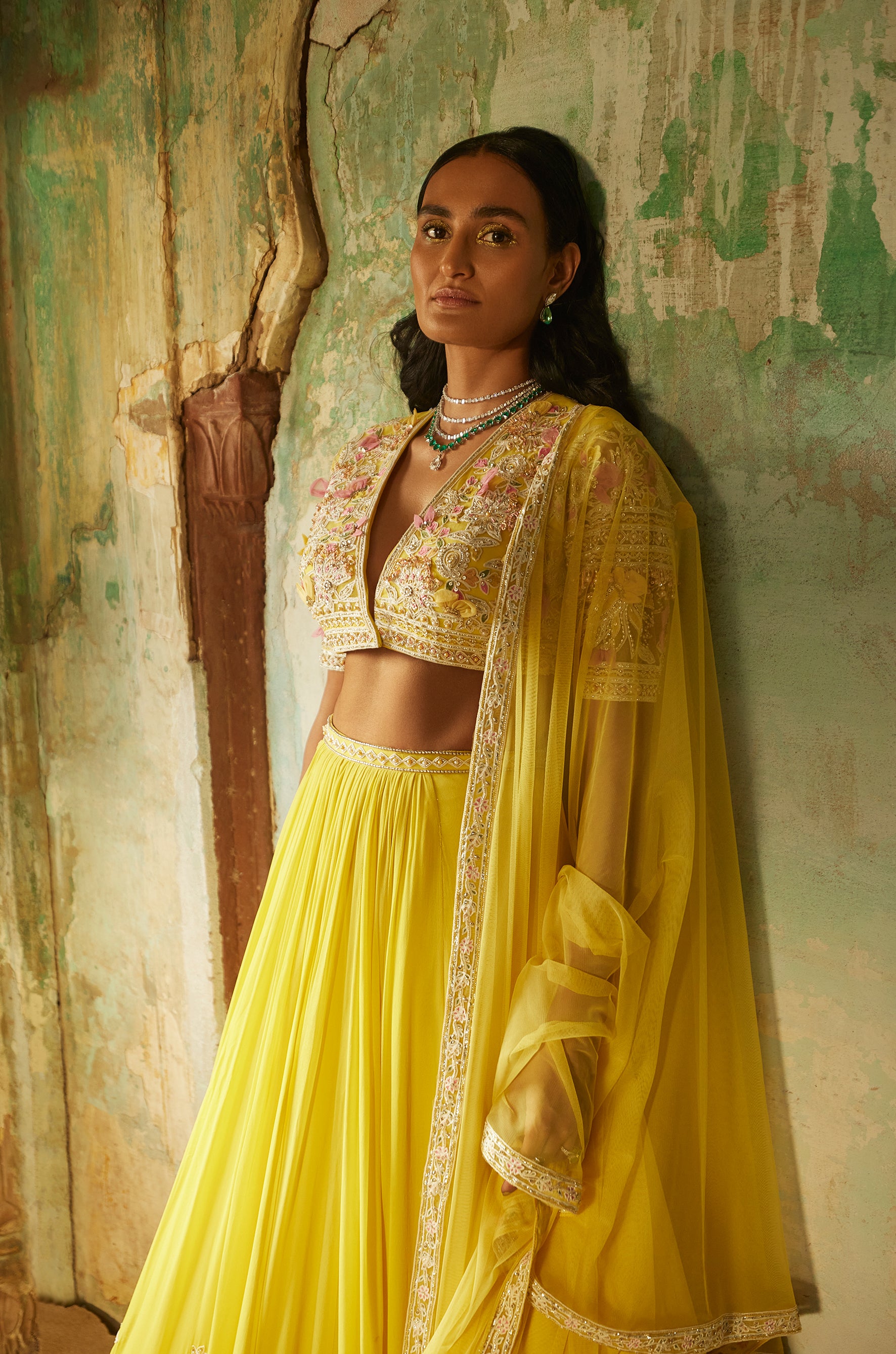 Yellow net embroidered blouse and georgette embroidered lehenga