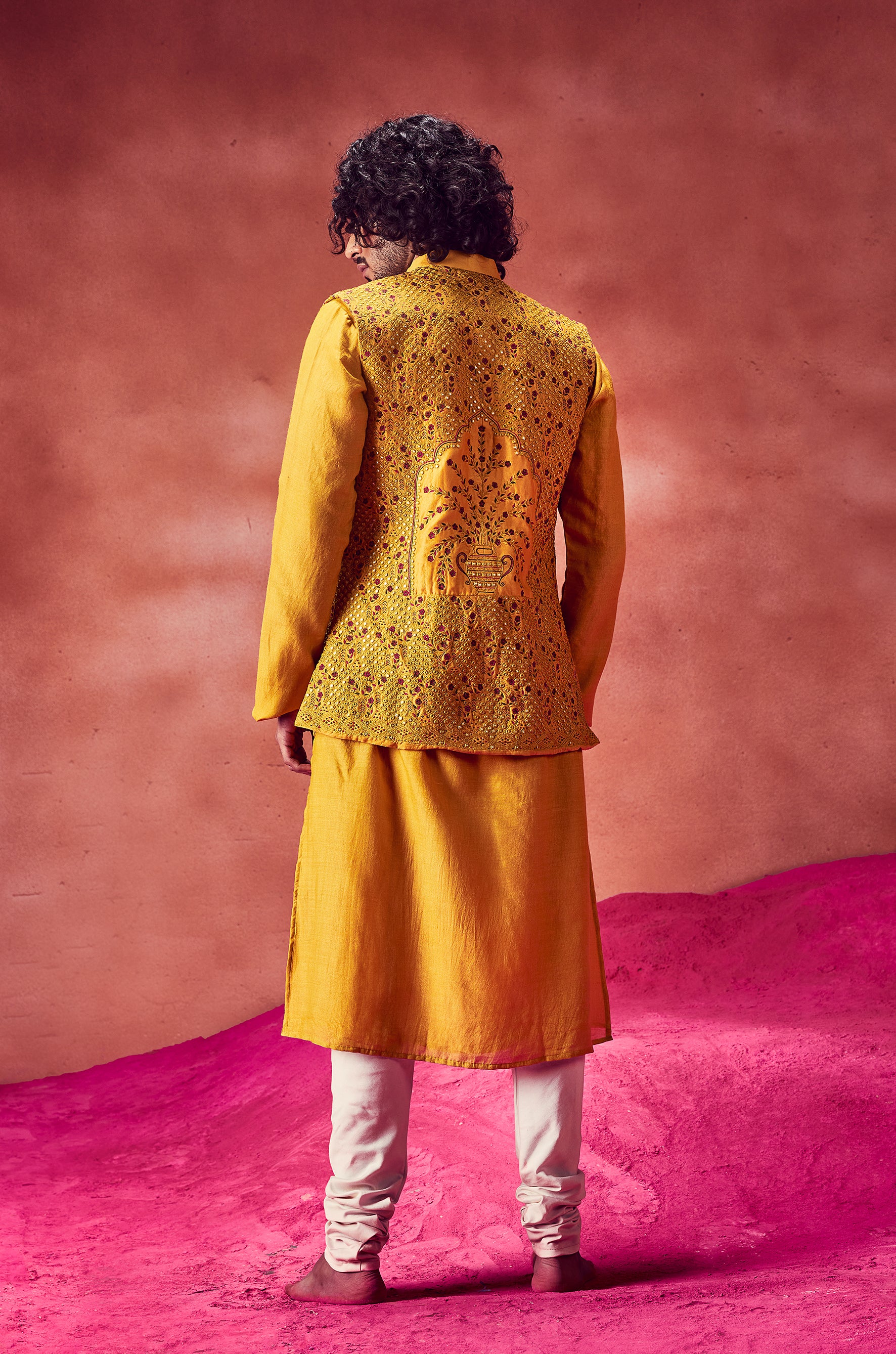 Yellow Kurta Paired With Emrboidered Bandi & Churidar