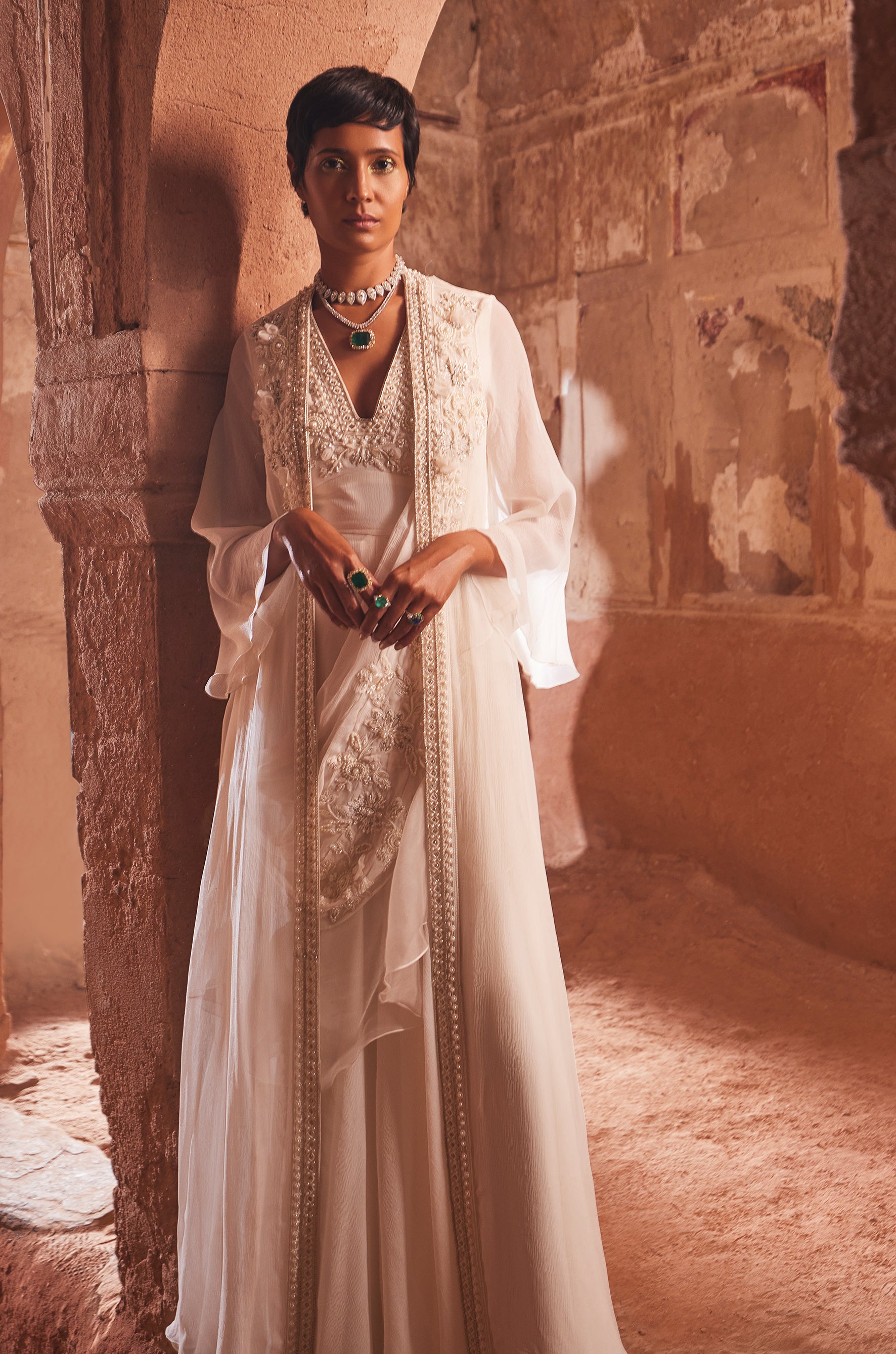 Ivory embroidered chiffon jacket and jumpsuit paired with embroidered chiffon drape